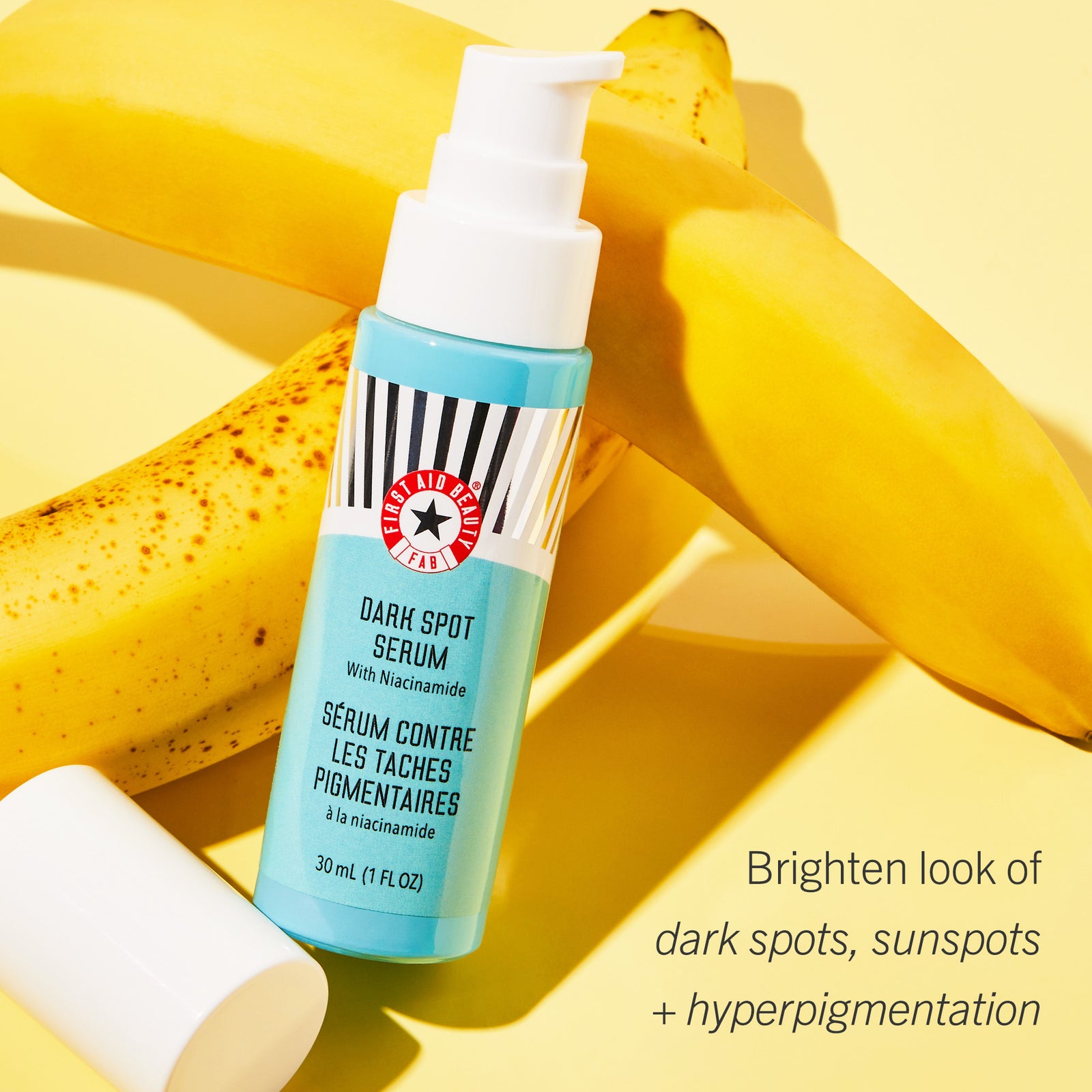 Dark Spot Serum with Niacinamide pictured with bananas. Brighten look of dark spots, sunspots + hyperpigmentation. 